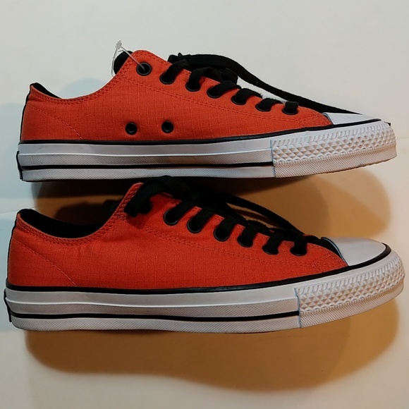 orange and black converse
